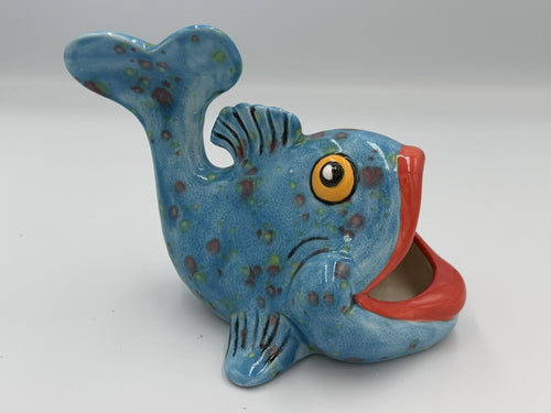 Sky blue speckled ceramic fish scrubby holder with amber eye and wide red open mouth