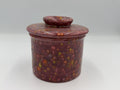 Maroon speckled ceramic butter bell with lid closed