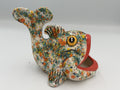 White ceramic fish scrubby holder with orange, teal, and yellow speckles, amber eye, and wide red open mouth