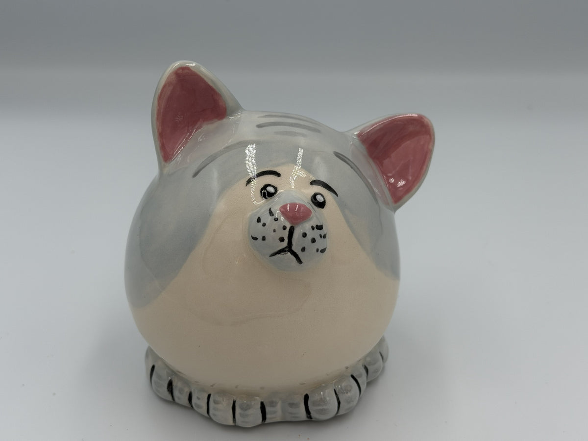 Round grey and cream ceramic cat bank with pink ears and hand-painted face