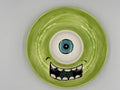 Lime green one-eyed monster ceramic chip and dip platter with toothy grin